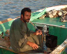 Local fisherman taking a traditional smoke break